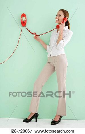 woman using telephone View Large Photo Image Stock Photo - woman using telephone. Fotosearch