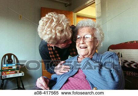 Woman visits her mother in nursing home. Pennsylvania, USA View Large Photo Image Stock Photography - Woman visits her mother in nursing home. Pennsylvania, USA. Fotosearch