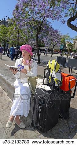 Woman waiting bus in Palermo city center, Palermo, Sicily, Italy View Large Photo Image Stock Image - Woman waiting bus in Palermo city center, Palermo, Sicily, Italy. Fotosearch