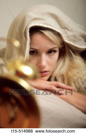 Woman waking up moody View Large Photo Image Stock Photo - Woman waking up moody. Fotosearch