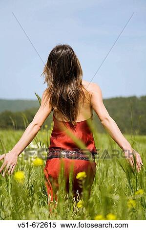 Woman waliking in the countryside View Large Photo Image Stock Photography - Woman waliking in the countryside. Fotosearch