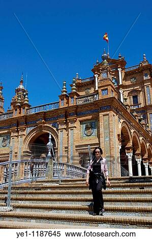 Woman walking around Plaza de Espana, Seville, Andalusia, Spain. View Large Photo Image Stock Photography - Woman walking around Plaza de Espana, Seville, Andalusia, Spain.. Fotosearch