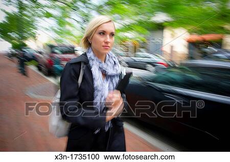 Woman walking on suburban sidewalk, Rockville Maryland View Large Photo Image Stock Image - Woman walking on suburban sidewalk, Rockville Maryland. Fotosearch