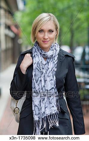 Woman walking on suburban sidewalk, Rockville Maryland View Large Photo Image Stock Photo - Woman walking on suburban sidewalk, Rockville Maryland. Fotosearch