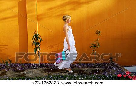 Woman walking View Large Photo Image Stock Image - Woman walking. Fotosearch