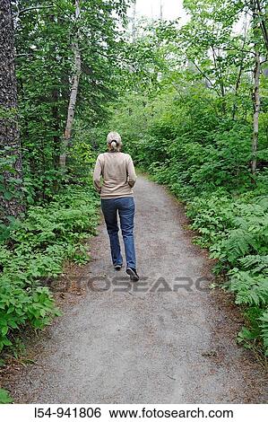 Woman walks trail at Ouimet Canyon Provincial Park Ontario Canada Lake Superior View Large Photo Image Stock Photograph - Woman walks trail at Ouimet Canyon Provincial Park Ontario Canada Lake Superior. Fotosearch