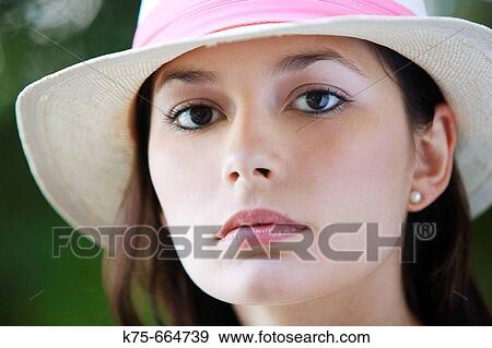 Stock Photo - Woman wearing hat. Fotosearch