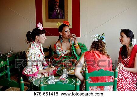 Woman wearing traditional flamenco dress at the April Fair, Seville, Spain. View Large Photo Image Stock Photo - Woman wearing traditional flamenco dress at the April Fair, Seville, Spain.. Fotosearch