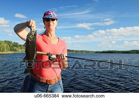 Woman with a bass View Large Photo Image Picture - Woman with a bass. Fotosearch