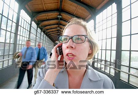 Woman with a cellphone. Berlin. Germany. View Large Photo Image Stock Photo - Woman with a cellphone. Berlin. Germany.. Fotosearch