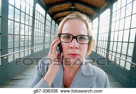 Woman with a cellphone. Berlin. Germany. View Large Photo Image Stock Photo - Woman with a cellphone. Berlin. Germany.. Fotosearch