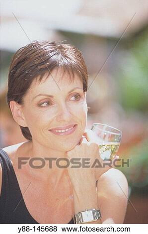Stock Photo - Woman with a glass of water. Fotosearch