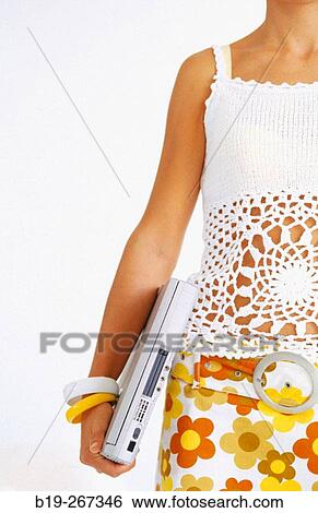 Woman with a portable computer View Large Photo Image Stock Photograph - Woman with a portable computer. Fotosearch