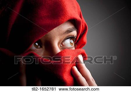 Woman with a red veil View Large Photo Image Stock Image - Woman with a red veil. Fotosearch