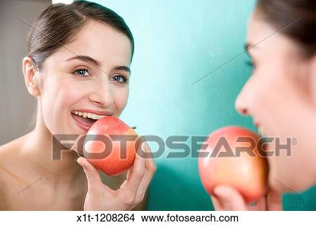 woman with apple. View Large Photo Image Picture - woman with apple.. Fotosearch