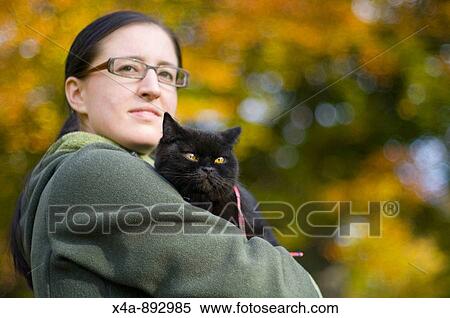 Woman with British shorthair cat View Large Photo Image Stock Photography - Woman with British shorthair cat. Fotosearch
