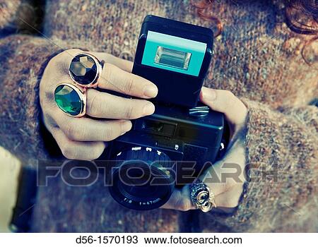 woman with camera in their hands View Large Photo Image Stock Image - woman with camera in their hands. Fotosearch