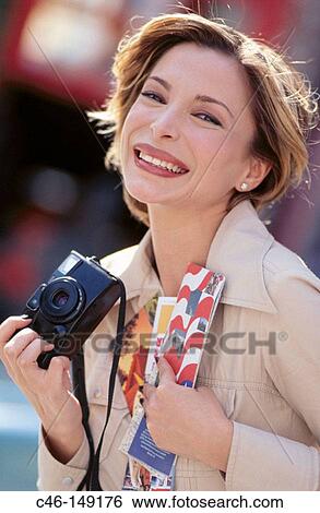 Woman with camera View Large Photo Image Stock Photograph - Woman with camera. Fotosearch