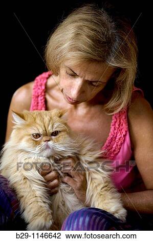 Woman with cat View Large Photo Image Stock Image - Woman with cat. Fotosearch