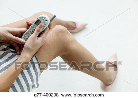 Woman with cellular phone View Large Photo Image Stock Photo - Woman with cellular phone. Fotosearch