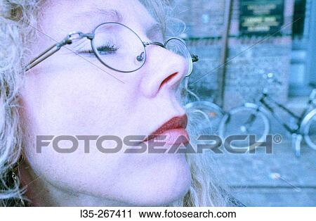 Woman with closed eyes View Large Photo Image Stock Image - Woman with closed eyes. Fotosearch