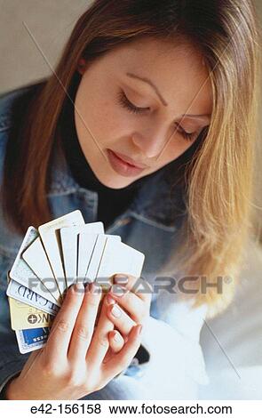 Woman with credit cards View Large Photo Image Stock Photo - Woman with credit cards. Fotosearch