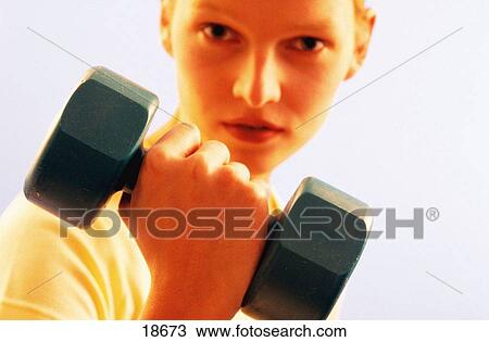 Woman with dumbbell View Large Photo Image Stock Image - Woman with dumbbell. Fotosearch