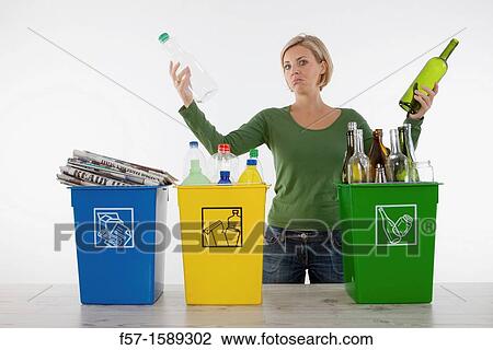 Woman with full recyling bins View Large Photo Image Stock Image - Woman with full recyling bins. Fotosearch
