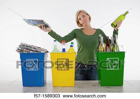 Woman with full recyling bins View Large Photo Image Stock Image - Woman with full recyling bins. Fotosearch