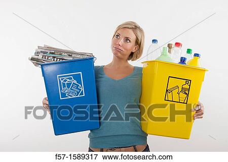 Woman with full recyling bins View Large Photo Image Stock Photo - Woman with full recyling bins. Fotosearch