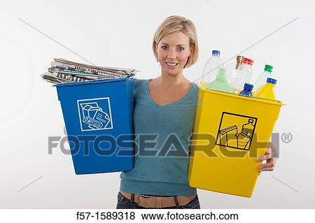 Woman with full recyling bins View Large Photo Image Stock Photo - Woman with full recyling bins. Fotosearch