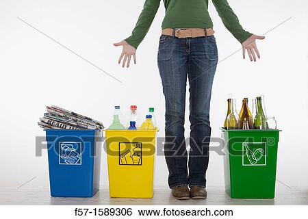 Woman with full recyling bins View Large Photo Image Stock Photograph - Woman with full recyling bins. Fotosearch