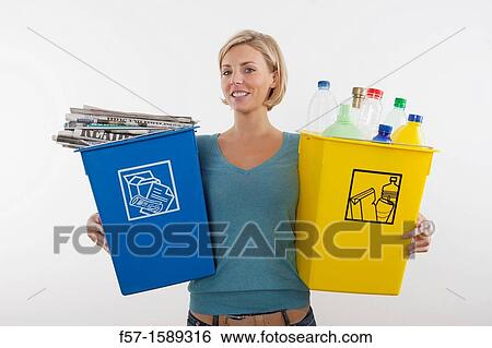 Woman with full recyling bins View Large Photo Image Stock Photograph - Woman with full recyling bins. Fotosearch