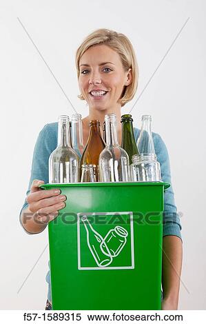 Woman with full recyling bins View Large Photo Image Stock Photography - Woman with full recyling bins. Fotosearch