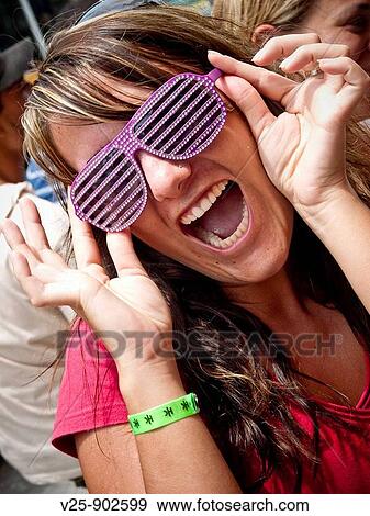 Stock Photo - Woman with funny glasses. Fotosearch