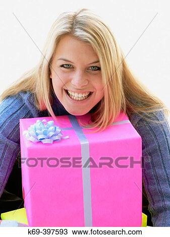 Woman with gift boxes View Large Photo Image Stock Image - Woman with gift boxes. Fotosearch