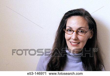 Woman with glasses View Large Photo Image Stock Image - Woman with glasses. Fotosearch