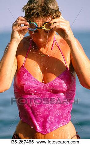 Woman with goggles View Large Photo Image Stock Photography - Woman with goggles. Fotosearch