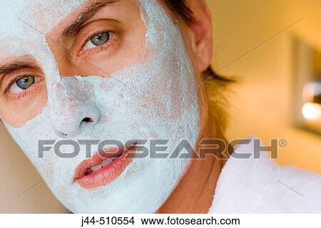 Woman with green facial mask View Large Photo Image Picture - Woman with green facial mask. Fotosearch
