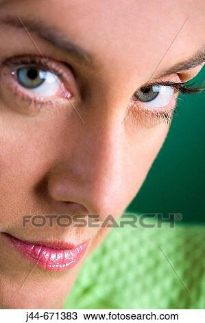 Woman with green shirt, Portrait, Extreme close-up View Large Photo Image Stock Image - Woman with green shirt, Portrait, Extreme close-up. Fotosearch