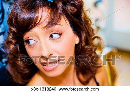 Woman with hair curled View Large Photo Image Stock Image - Woman with hair curled. Fotosearch