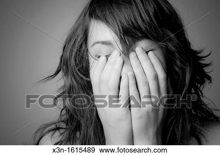 woman with hands over face View Large Photo Image Stock Photo - woman with hands over face. Fotosearch