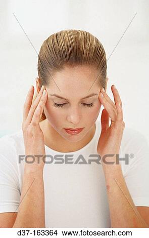 Woman with headache View Large Photo Image Picture - Woman with headache. Fotosearch