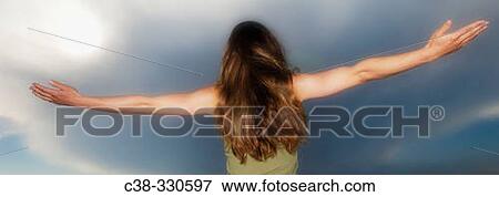 Woman with her arms open View Large Photo Image Stock Photo - Woman with her arms open. Fotosearch