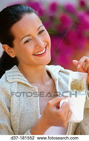 Woman with herbal tea View Large Photo Image Stock Image - Woman with herbal tea. Fotosearch