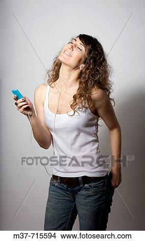 Woman with Ipod. View Large Photo Image Picture - Woman with Ipod.. Fotosearch