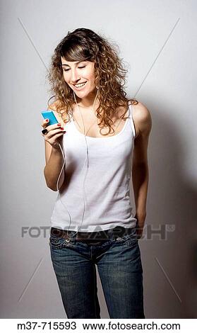Stock Image - Woman with Ipod.. Fotosearch