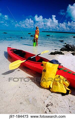 Woman with kayak at edge of lagoon. Aitutaki. Cook Islands View Large Photo Image Stock Image - Woman with kayak at edge of lagoon. Aitutaki. Cook Islands. Fotosearch