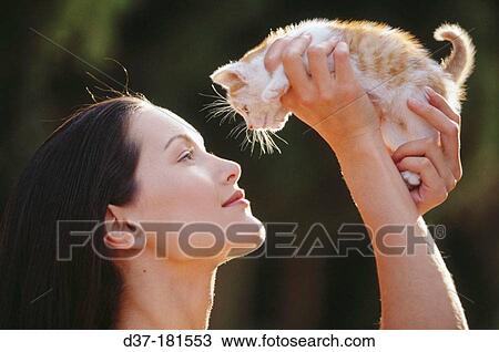 Woman with kitten View Large Photo Image Stock Image - Woman with kitten. Fotosearch