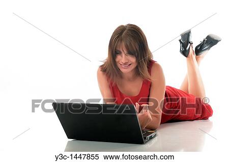 Woman with laptop computer on white floor View Large Photo Image Stock Photography - Woman with laptop computer on white floor. Fotosearch